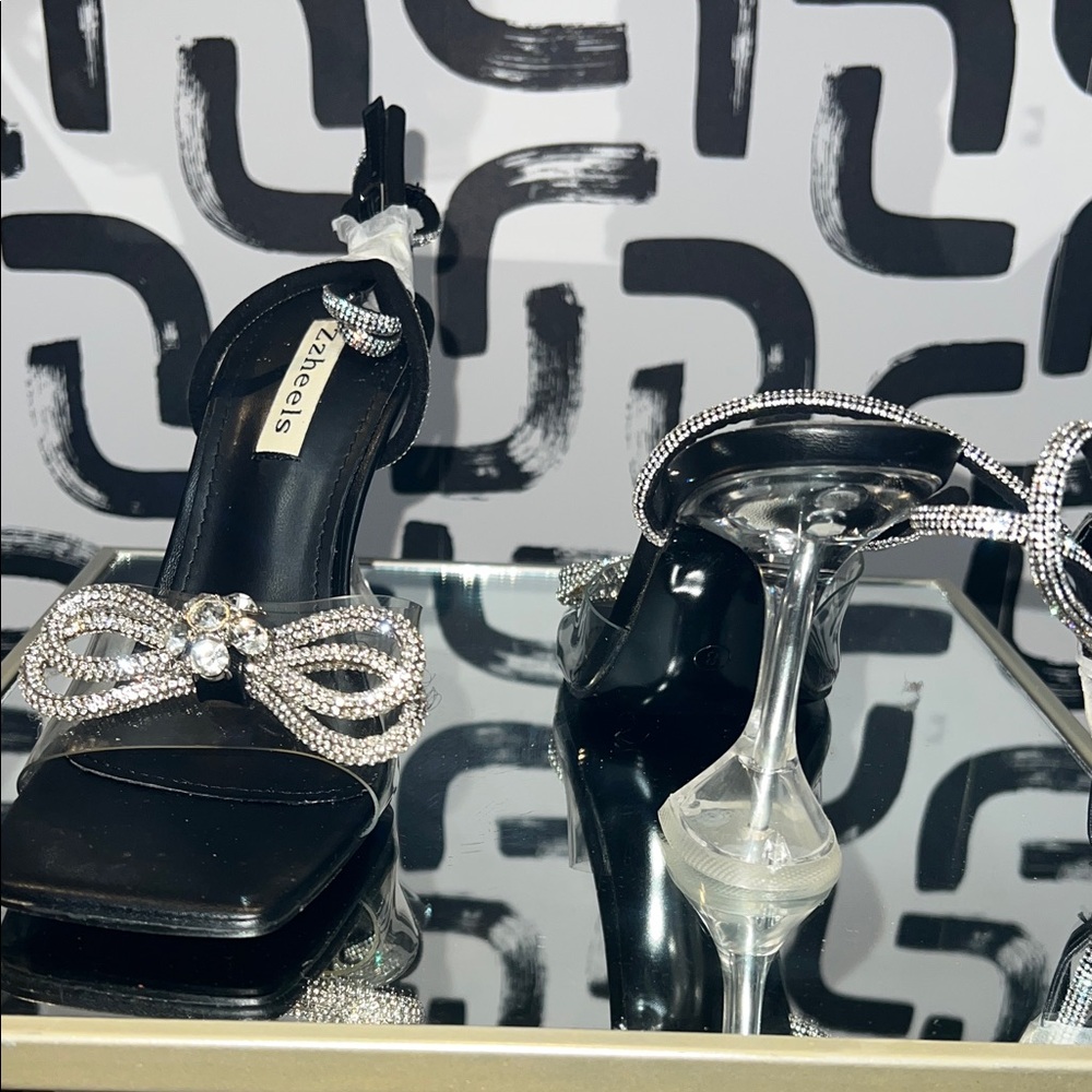 Dazzling Black and Silver Heels with Bow Accent
